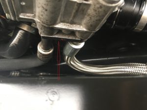 BMW 535xi oil cooler lines on a oil cooler hub.