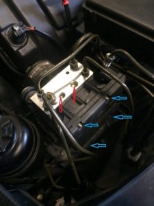 Jaguar abs control module bolted to Abs module.