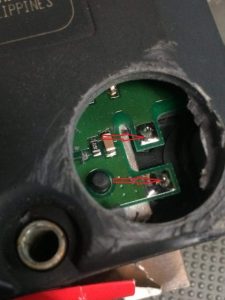 Jaguar Abs Control Unit with broken electrical connections where repairs will be made.