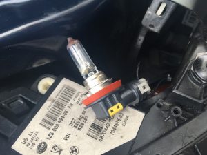 BMW 535xi daytime light bulb, or angel eye lights, removed from a BMW headlight assembly.