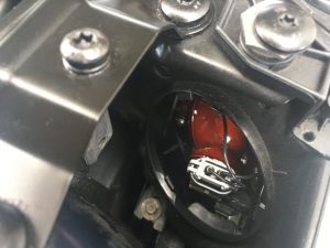 BMW parking light reflector and electrical connector.