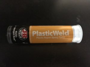 J-B weld putty glue package which is used to fix axle.