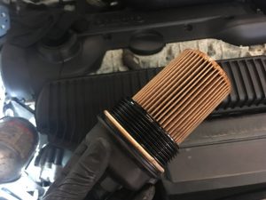 Volvo used Oil Filter removed from oil filter housing to be replaced with a new filter.