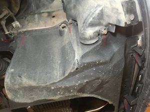 Ford Escape side plastic cover which has to be removed.