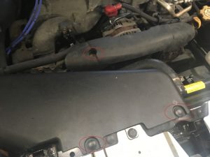 Air ducts and belt cover on a Subaru forester 4 cylinder 2.5 liter engine.
