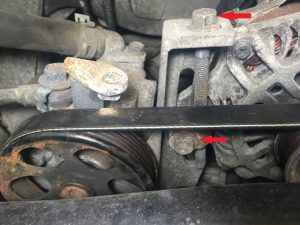 Alternator bolt creating tension on new serpentine belt.