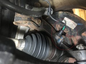 Hyundai Elantra front right abs sensor and front wheel hub.