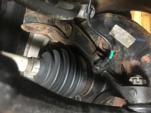 Hyundai Elantra Abs Sensor wire clip on front strut mount.