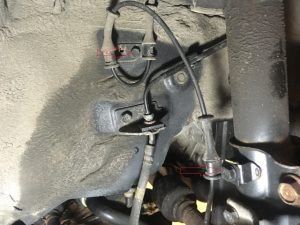 Hyundai Elantra Abs Sensor wire positioning on car frame clips.