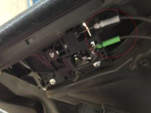 Subaru Forester Front Door with Lock Cables attached to door latch, green and white connectors.