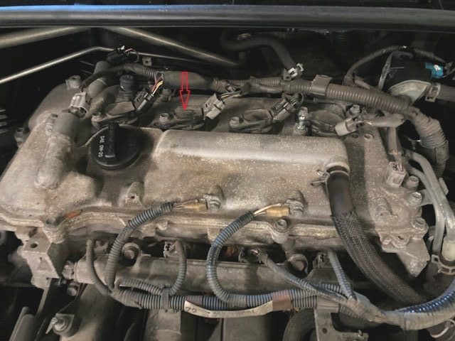 Toyota engine 1.8 liter with plastic engine cover removed.