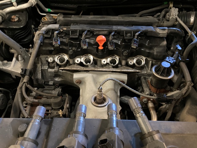 Acura ILX engine with ignition coils removed.