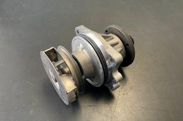 Engine water pump is driven by serpentine belt, failure will cause temperature gauge to rise due to overheating.