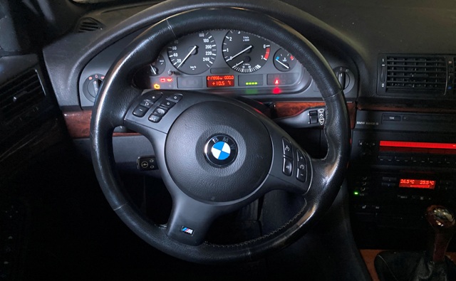 BMW M5 E39 with steering wheel out of alignment, steering wheel is pulling to right side.