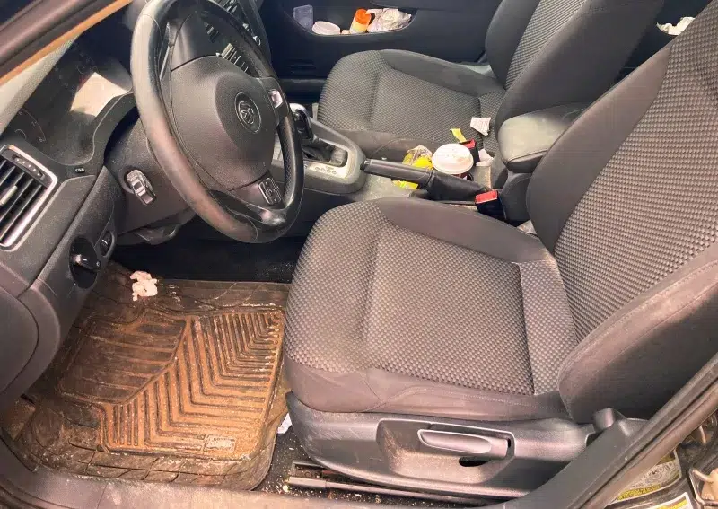 A dirty and run down used car interior. Cleaning your car before listing for sale privately is most important.